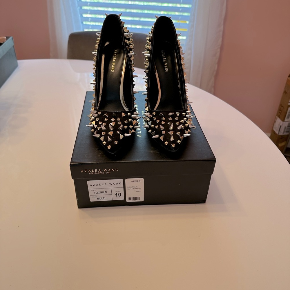 Azalea Wang spiked pumps.
